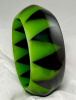 WT4 claw resin bangle in transparent green & black